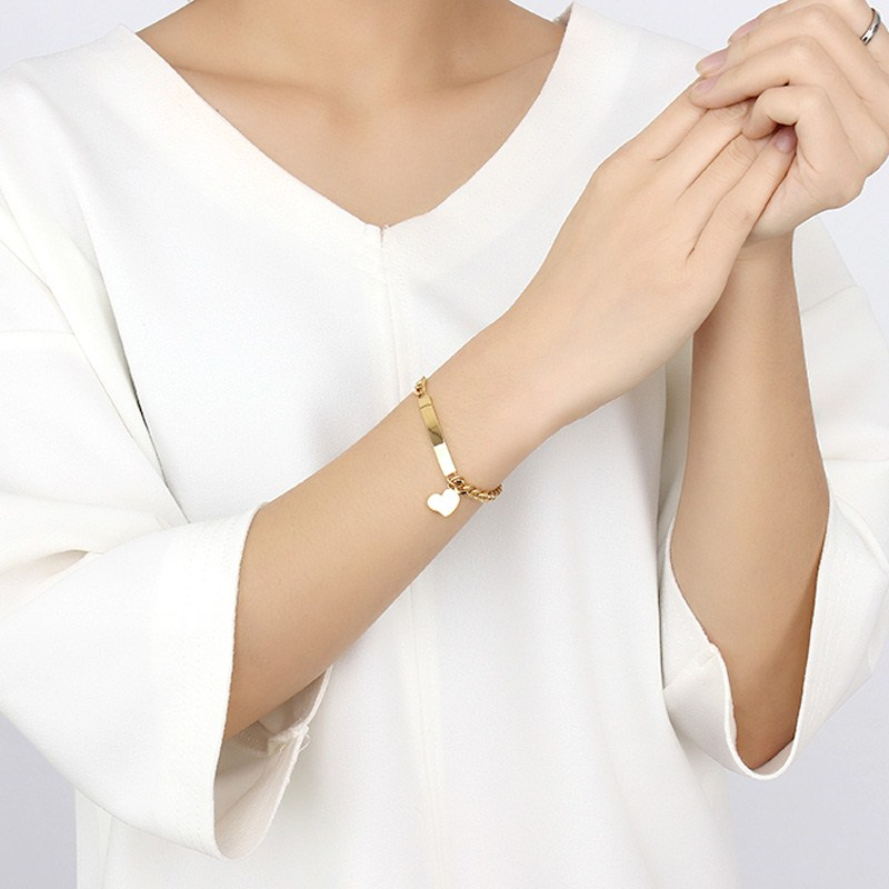 Personalisiertes Armband aus Edelstahl mit eigenem Namen Wunschtext Gravur Herz Symbol